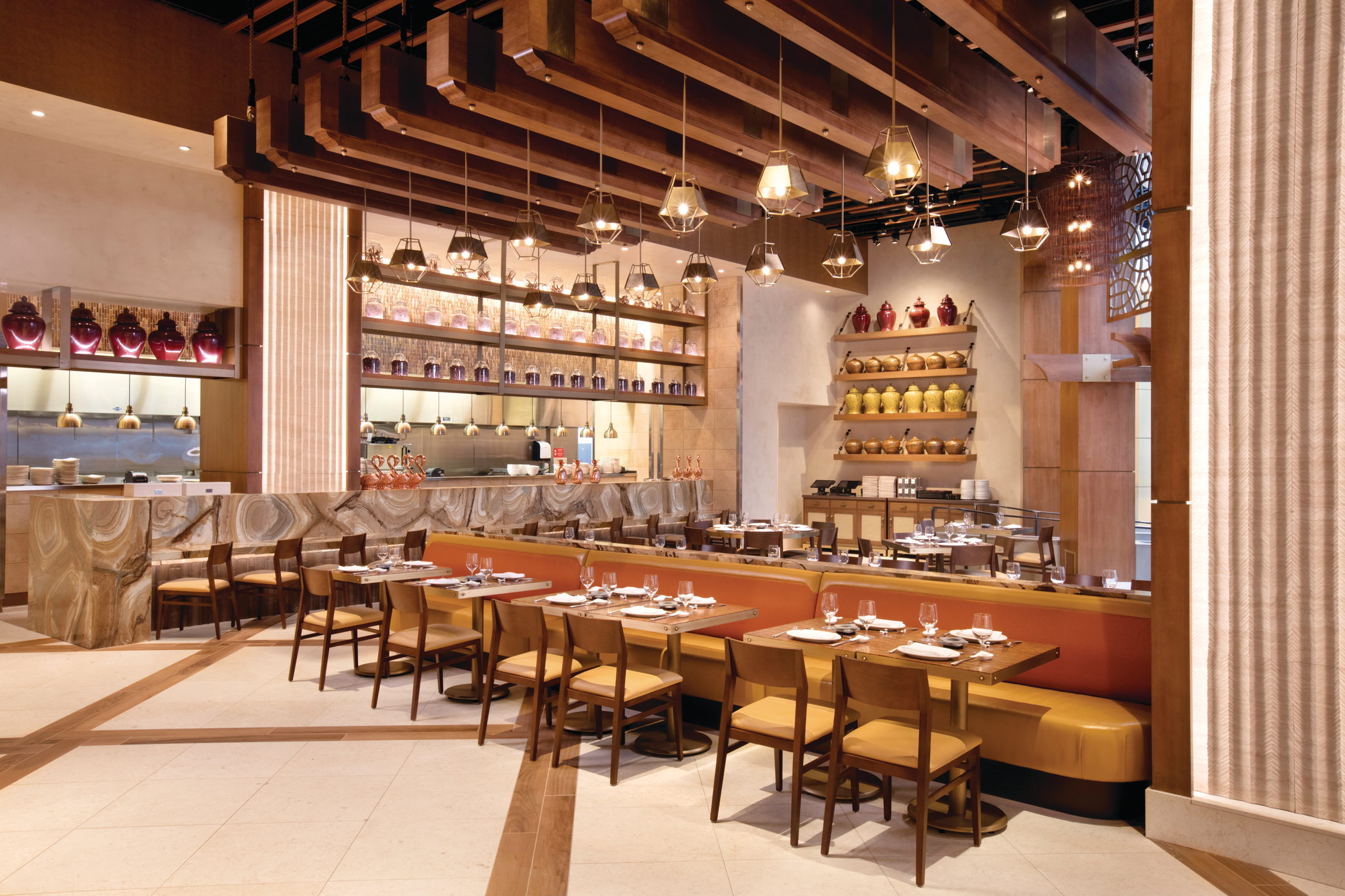a restaurant with tables and chairs