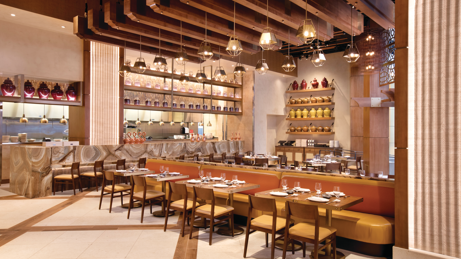 a restaurant with tables and chairs