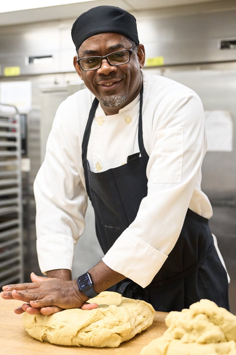 a person in a chef's hat and apron