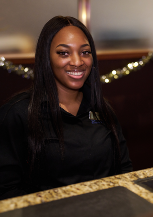 a person smiling at the camera