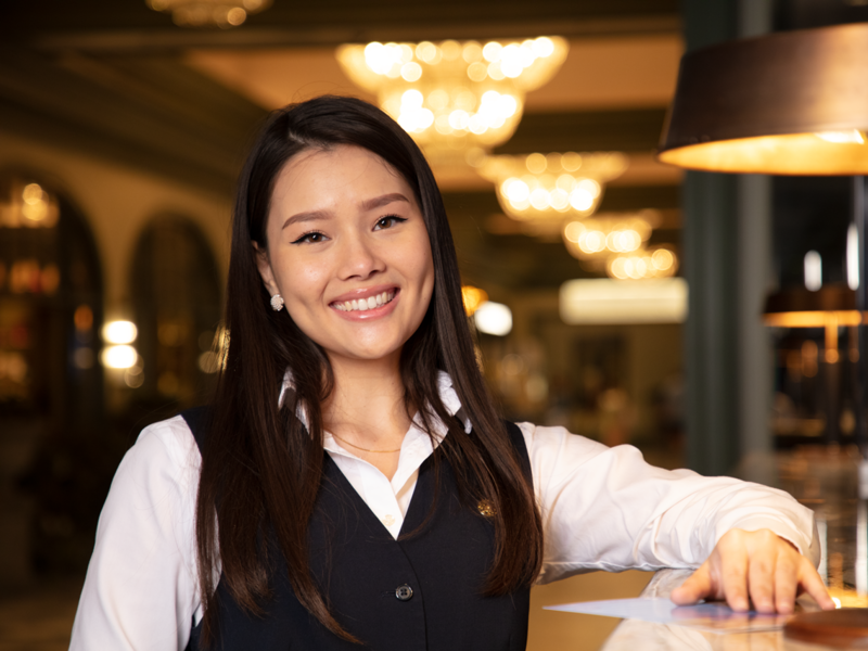a person smiling at the camera