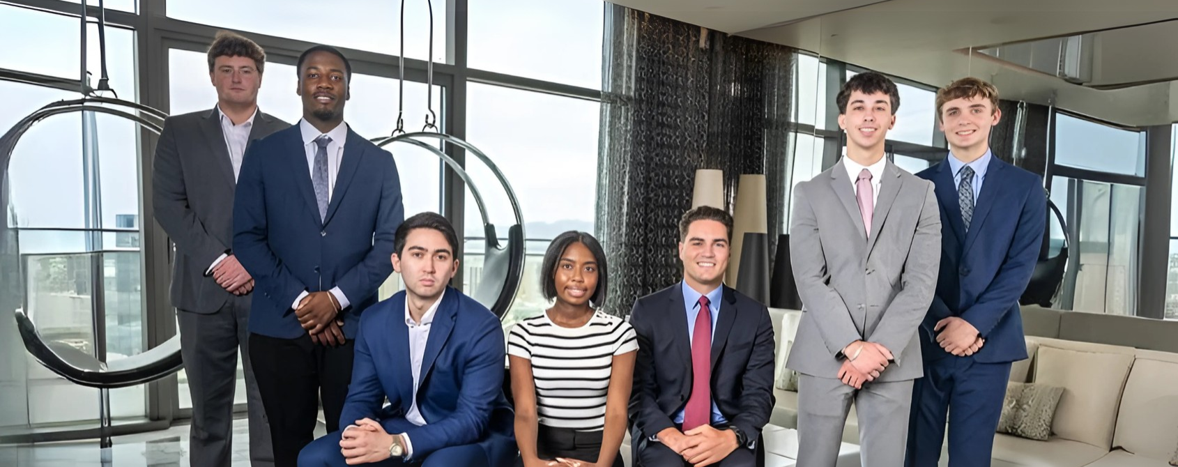 a group of people posing for a photo