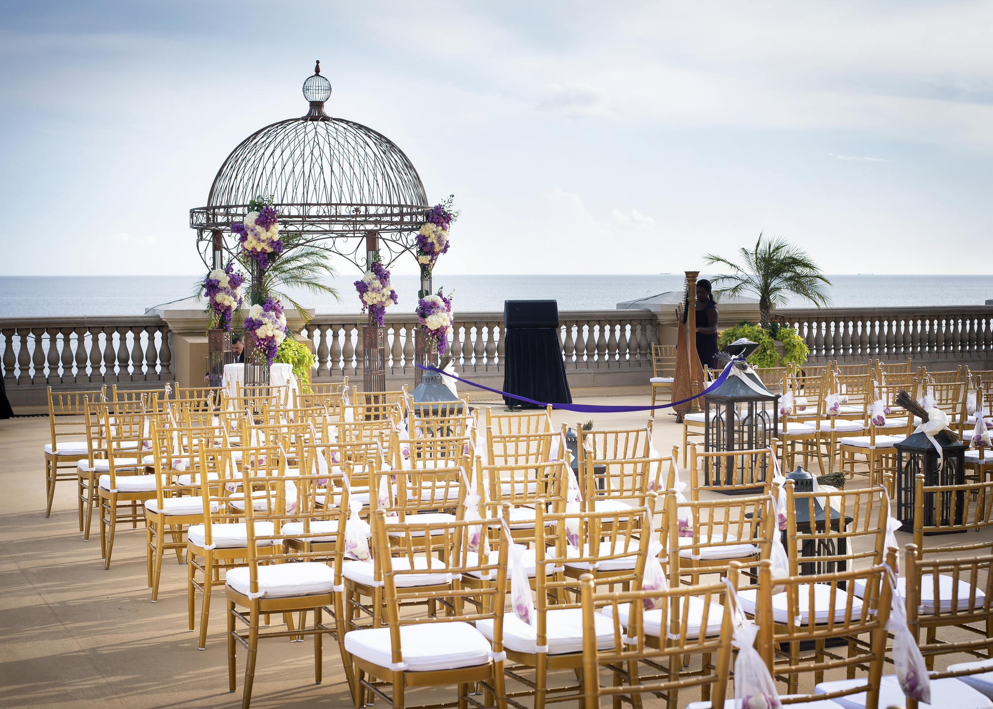 a group of chairs in a wedding setting