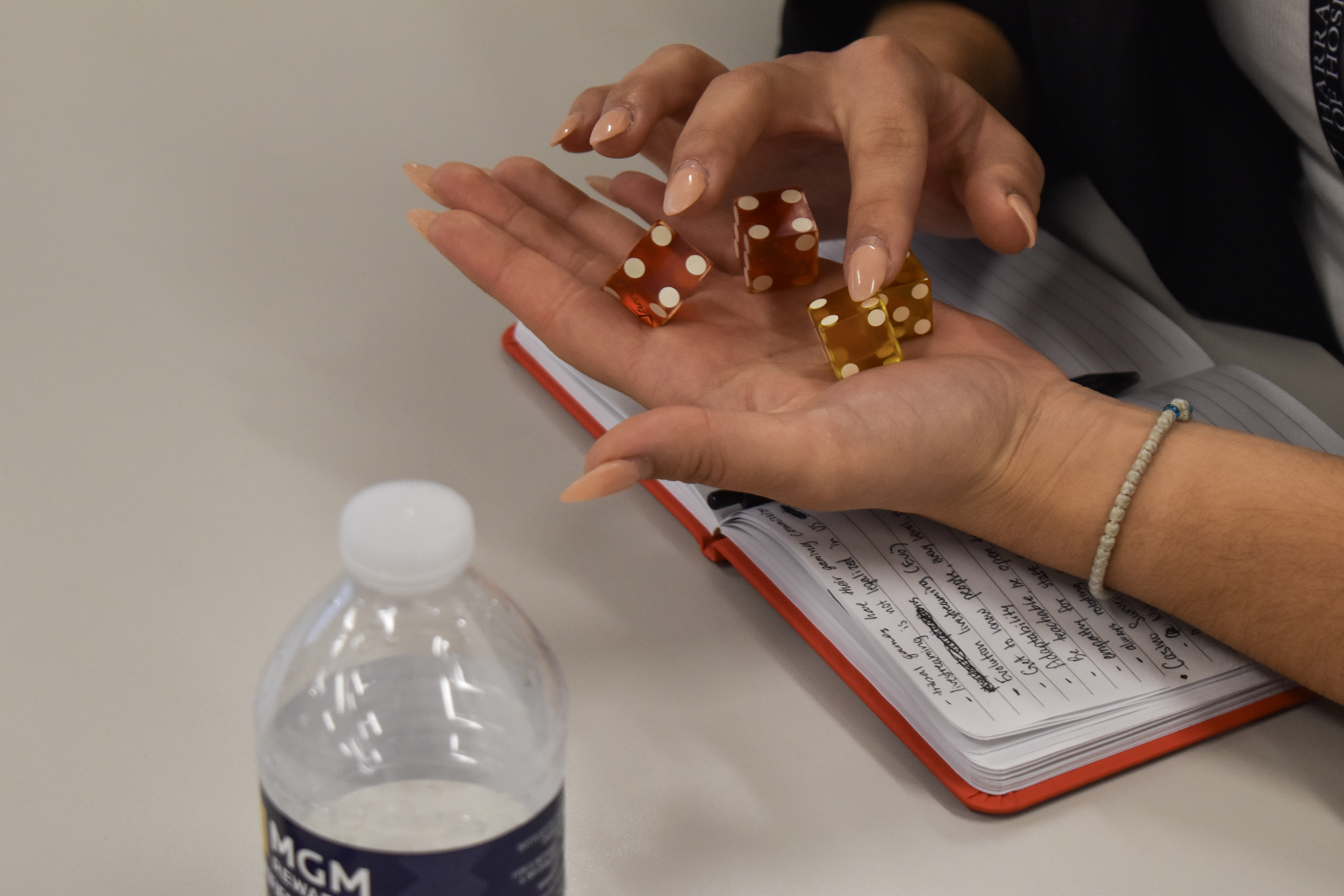 a hand holding dice