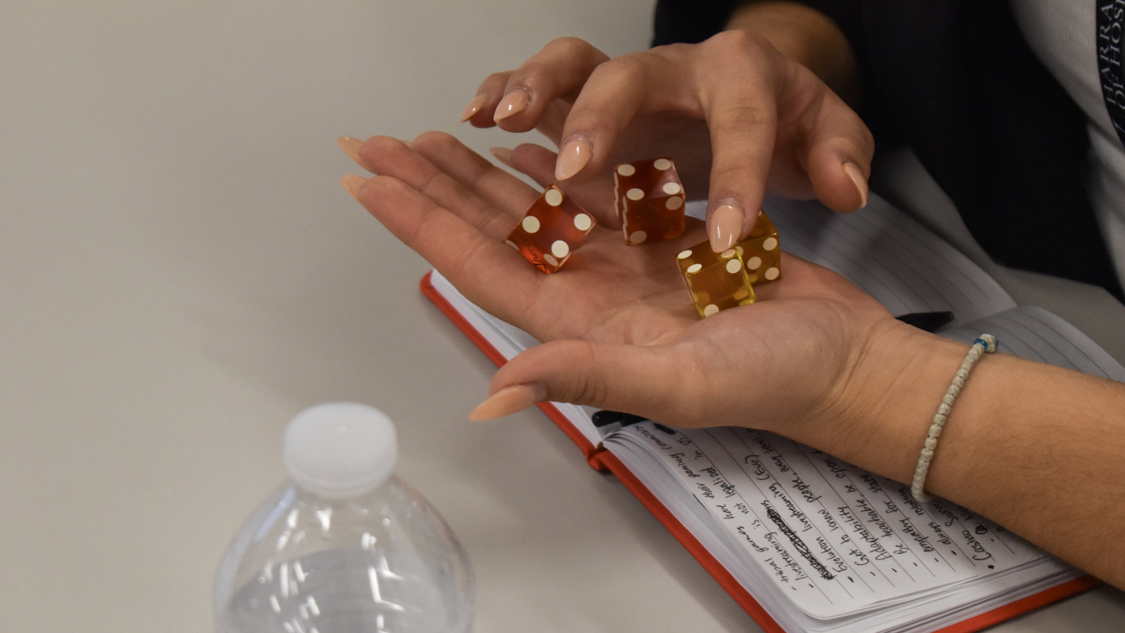 a hand holding dice