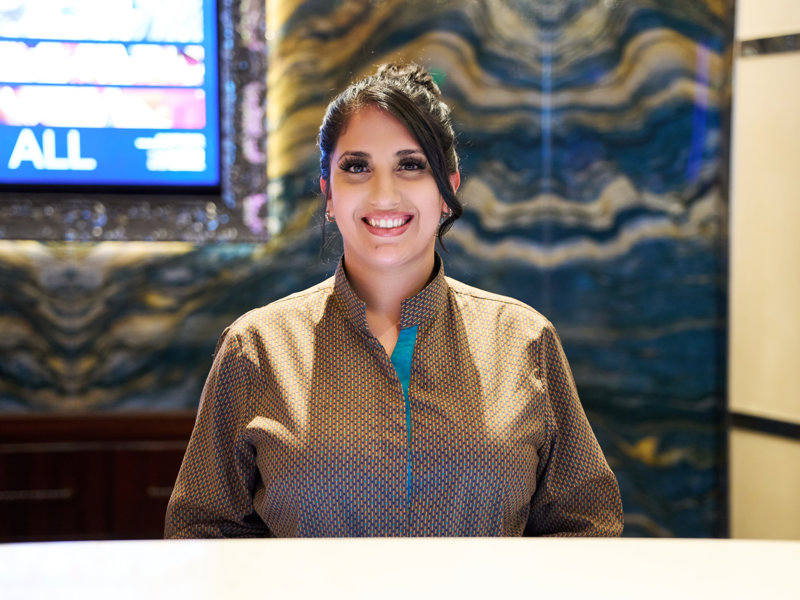 a person smiling at camera