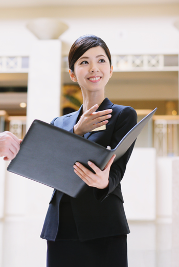 a person holding a folder