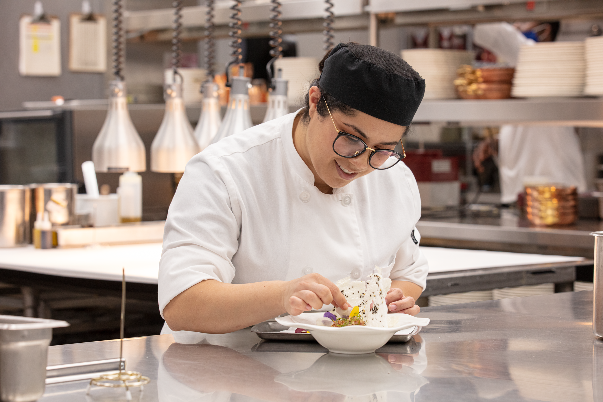 a person in a chef's kitchen