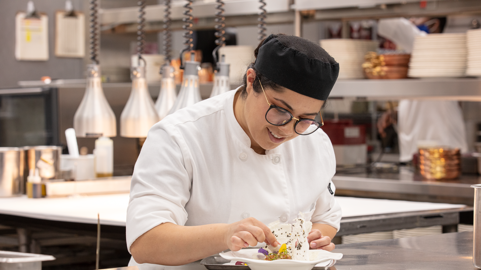 a person in a chef's kitchen