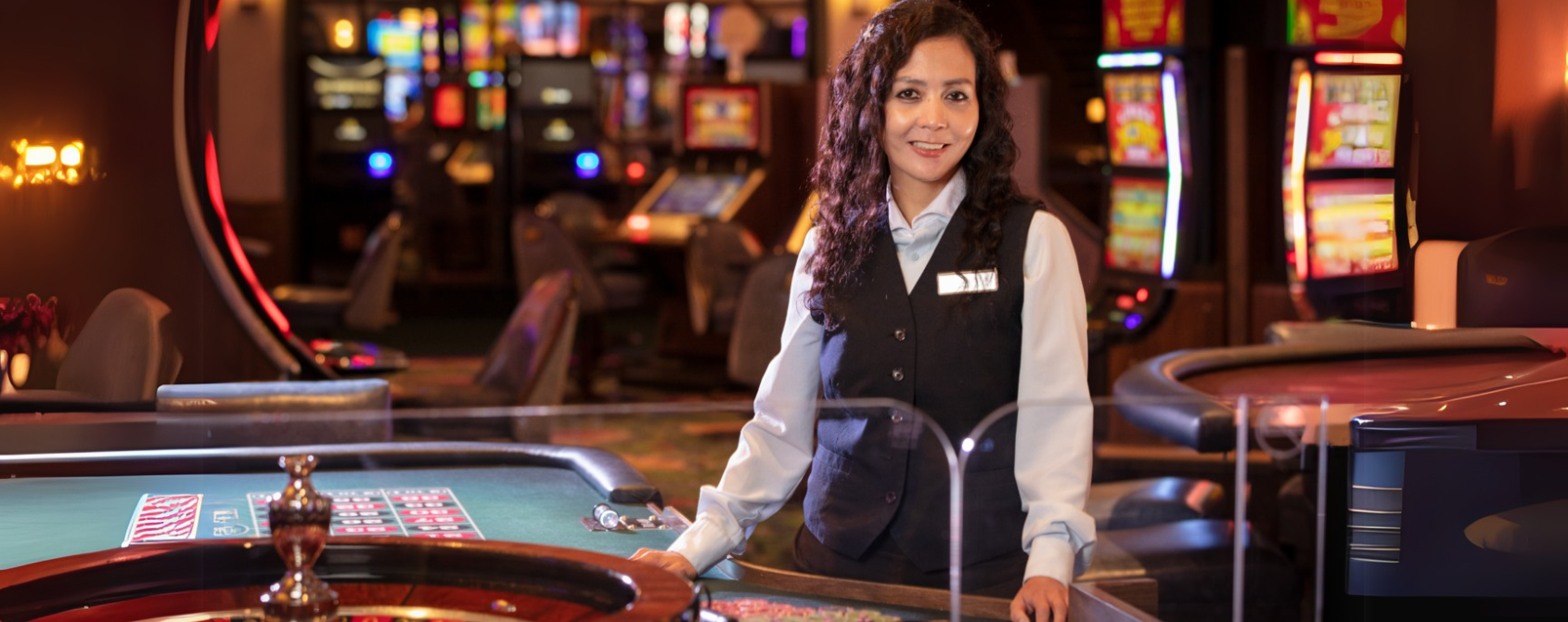 a person standing at a casino table