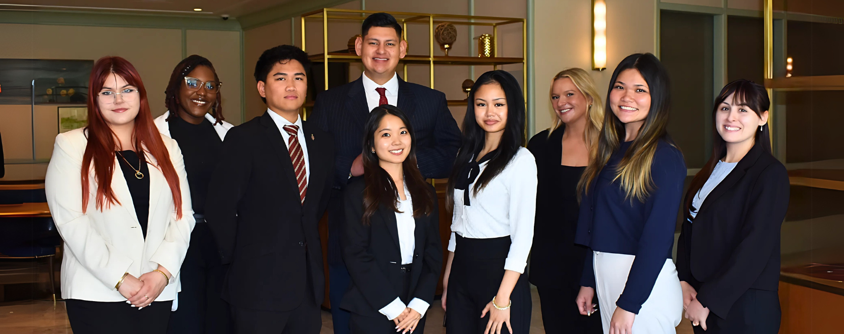 a group of people posing for a photo