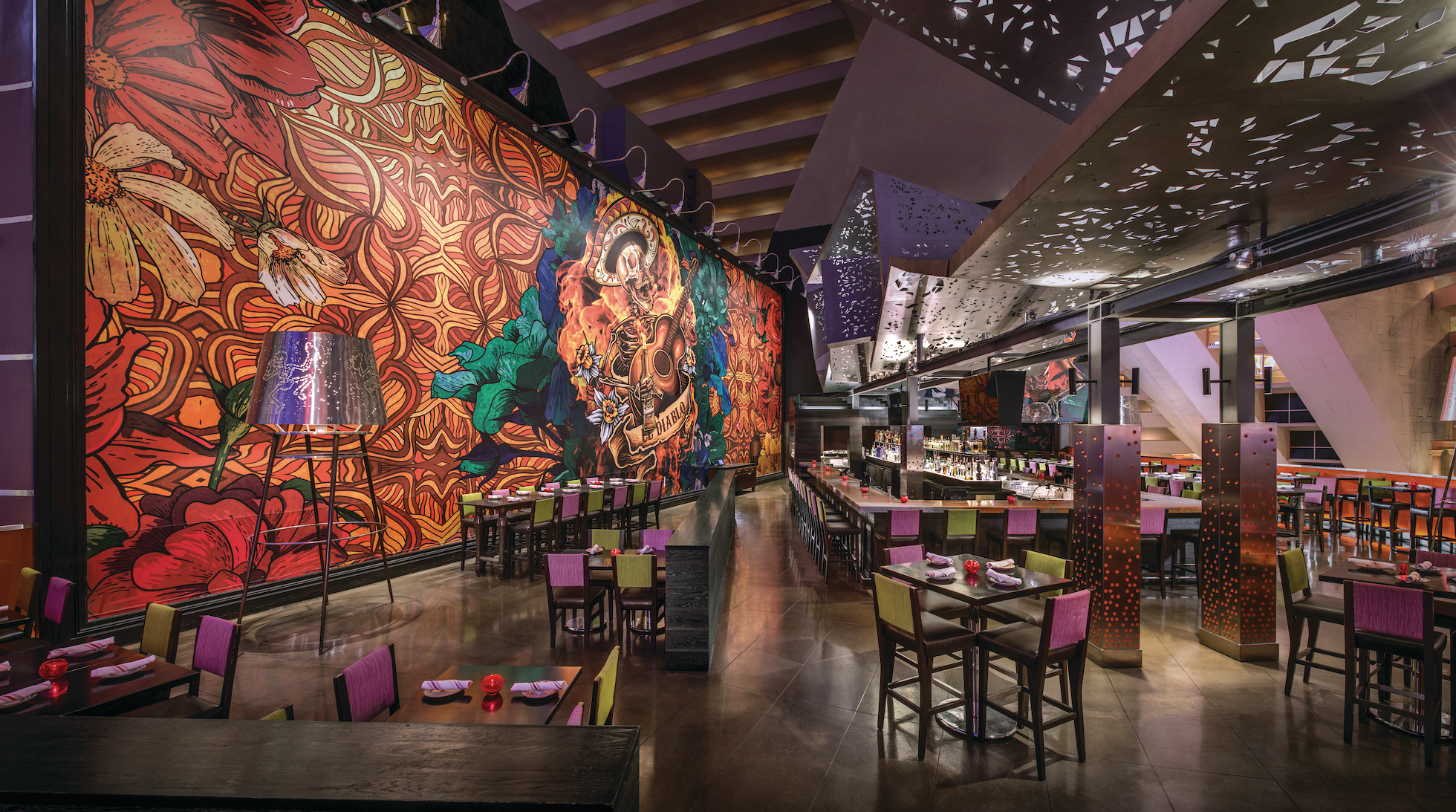 a restaurant with tables and chairs