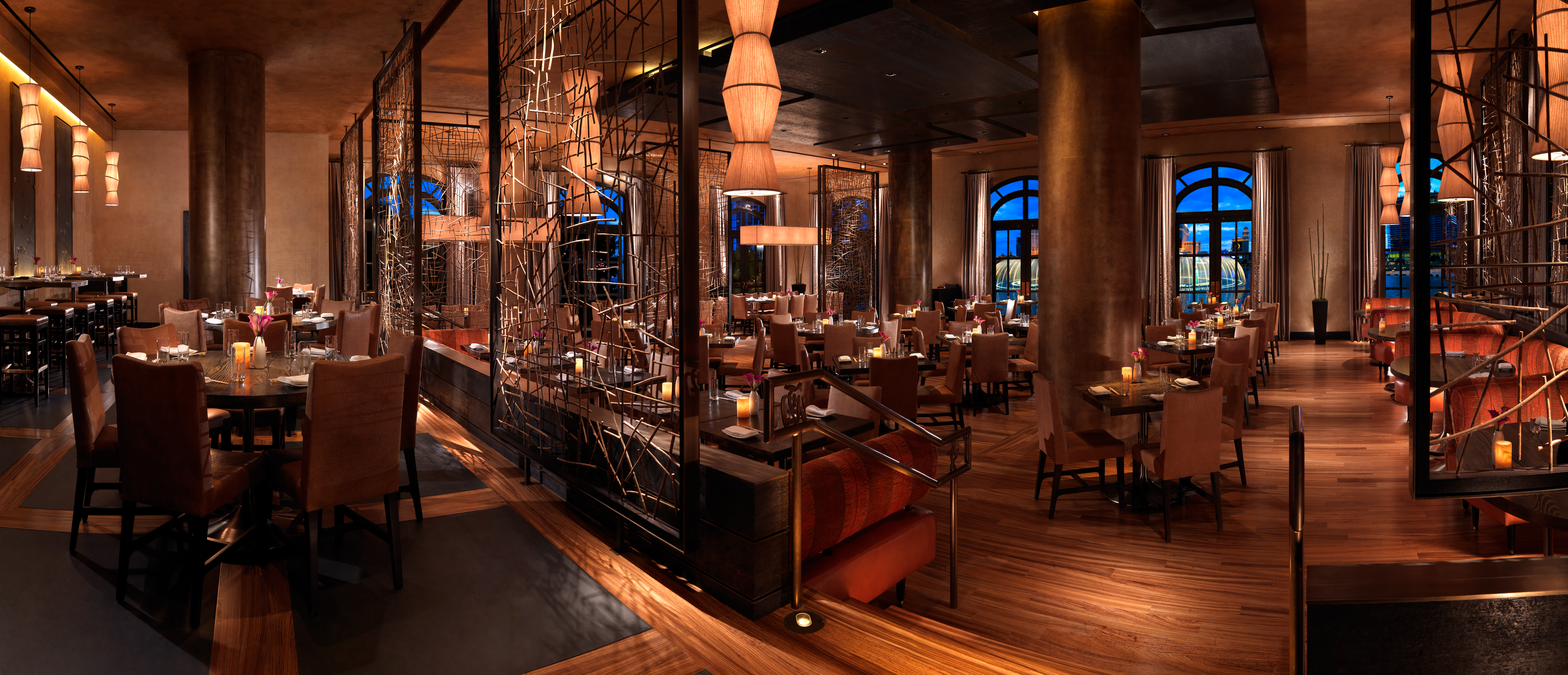 a restaurant with tables and chairs