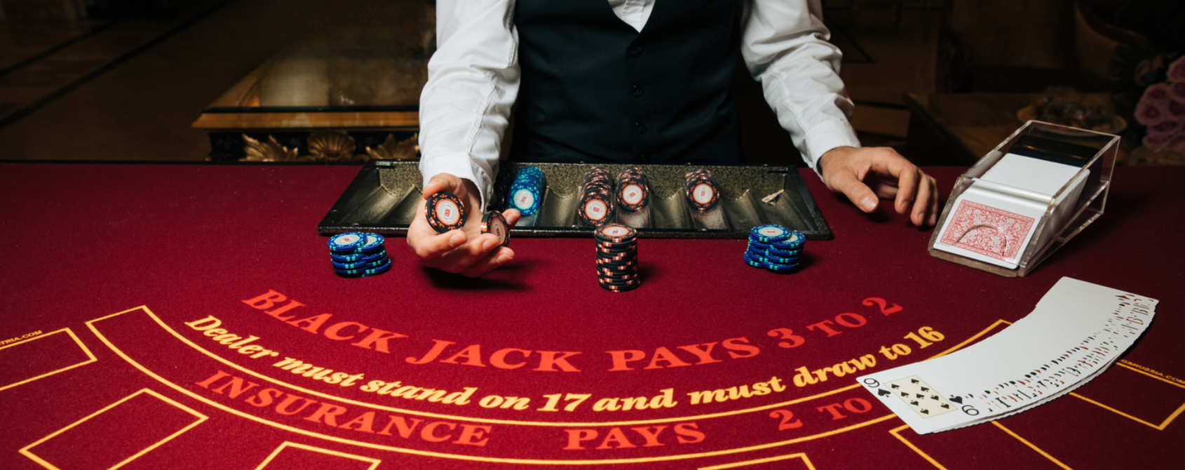 a person holding poker chips