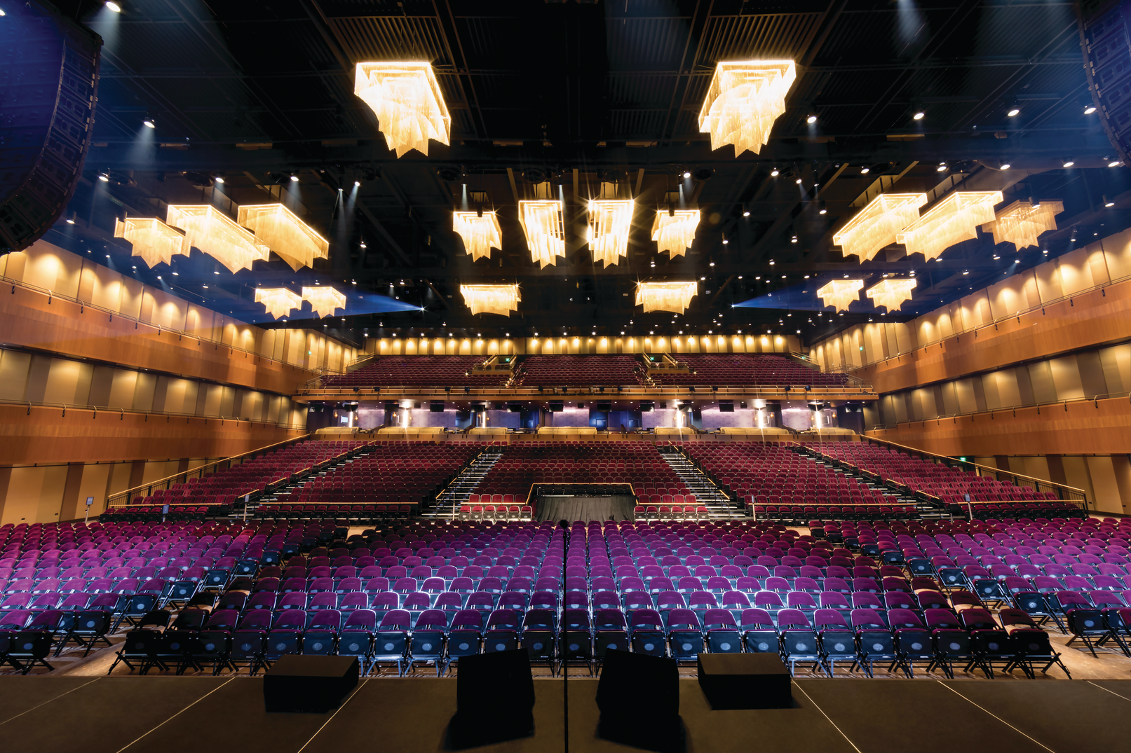 a large auditorium with rows of seats