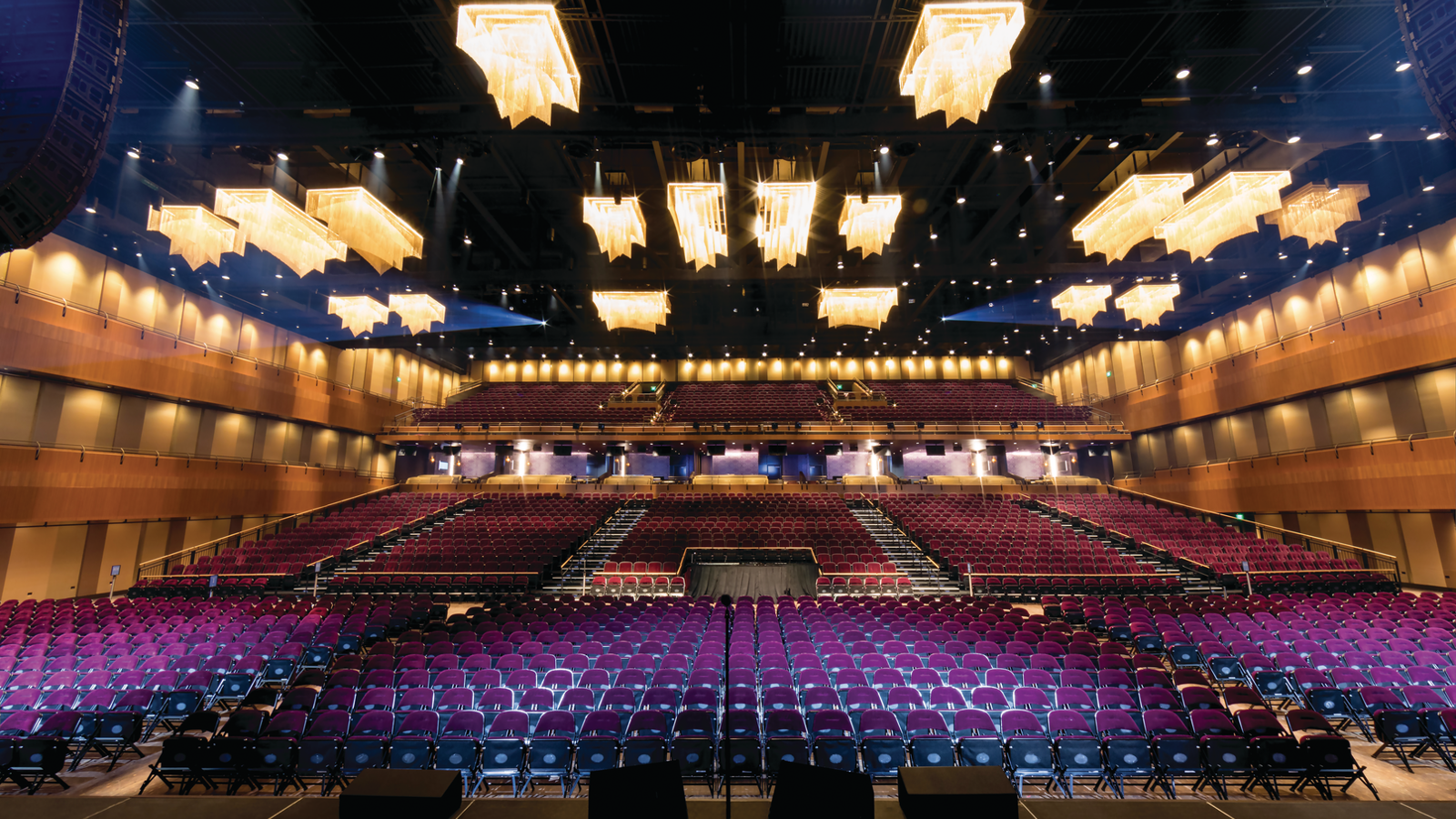 a large auditorium with rows of seats