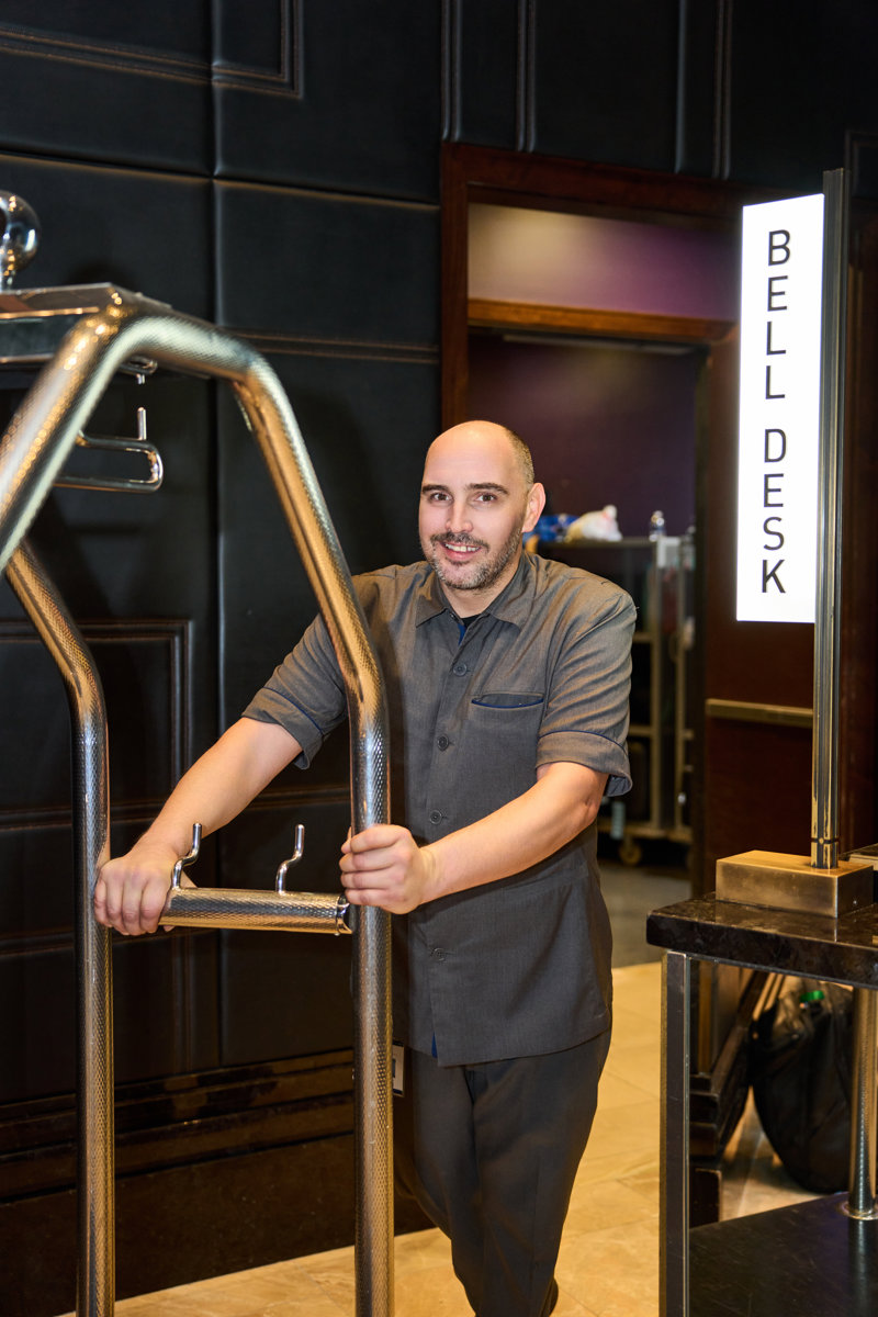 a person holding a metal bar