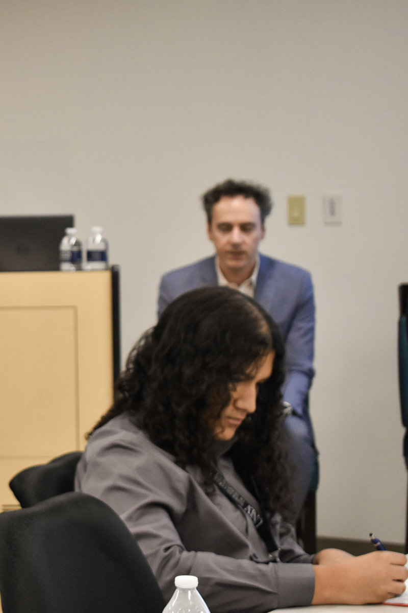 a group of people sitting in a room